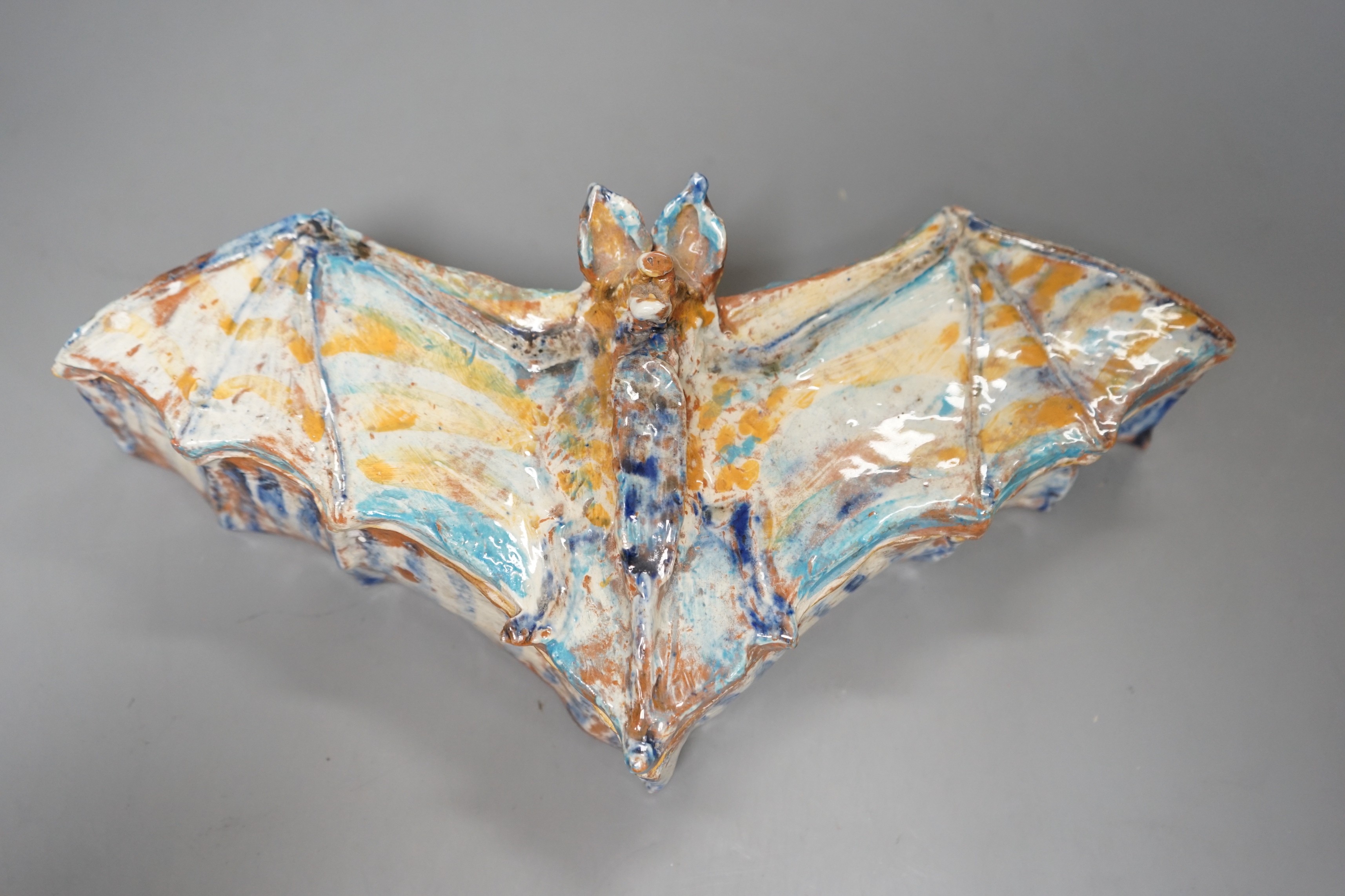 Ann Stokes (1922-2014), a bat shaped pottery box and cover, 29cm wide